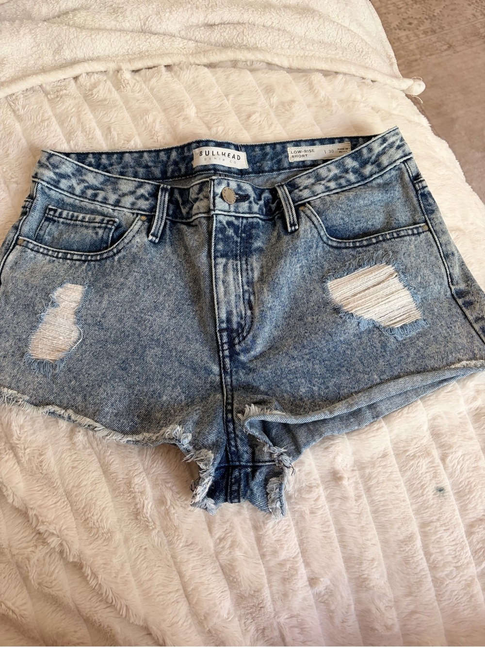 Bullhead Women’s Light Blue Distressed Denim Shorts